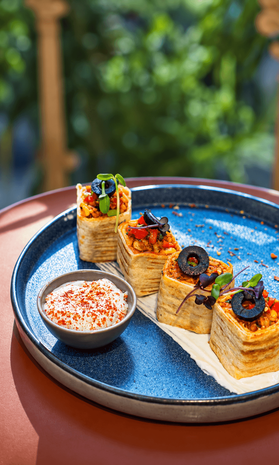 Crisp filled rolls served with a creamy dip